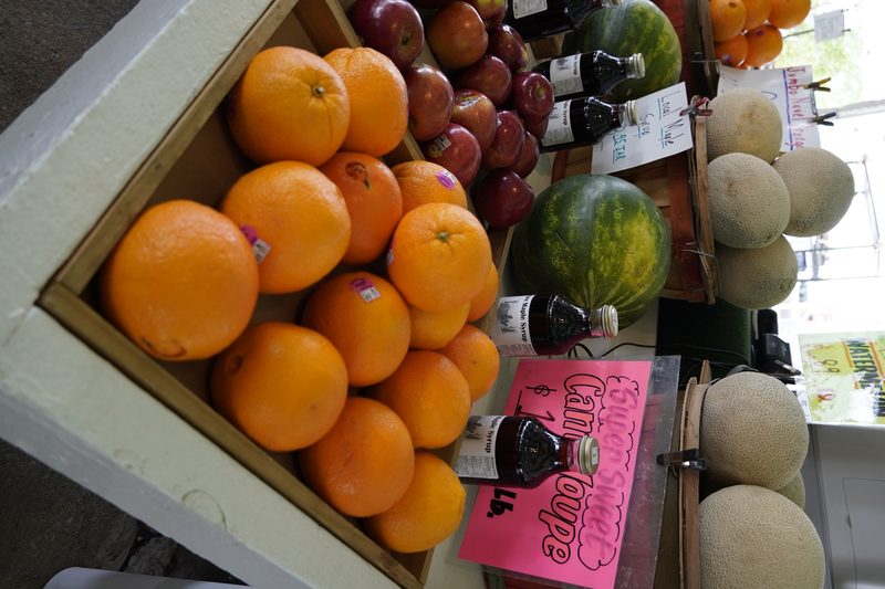 Variety of citrus fruits and melons
