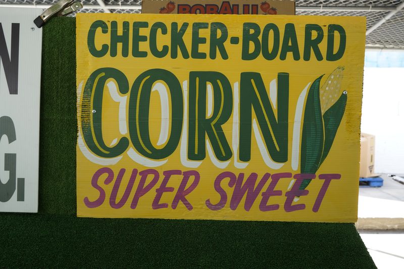 Checker-board super sweet corn sign